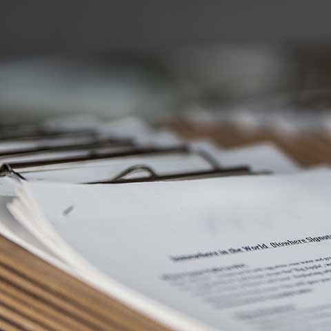 paper sheets on table