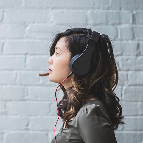 woman listening with headset